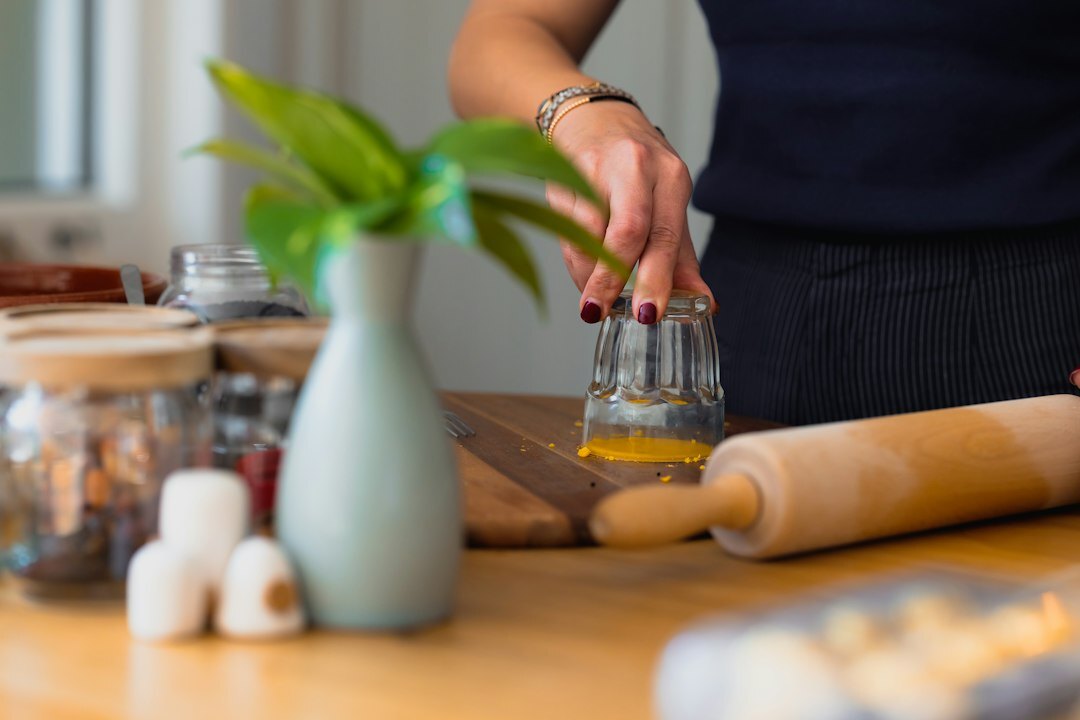 Woman preparing dough in a home kitchen